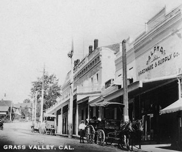 Old postcard of Grass Valley, California, showing the Alpha Building. Old Postcard of Grass Valley, California showing the Alpha Building